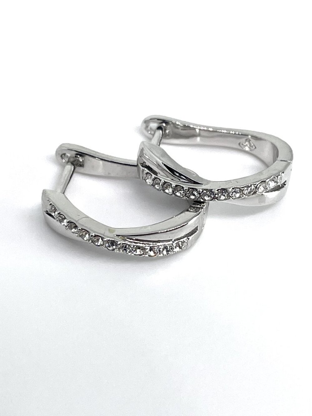 Criss Cross Rhodium Plated Huggie Earrings, made with Crystals by Swarovski - Picture 3 of 4